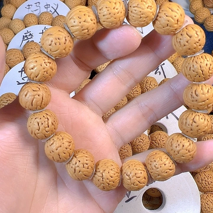 墨***曦桃核吊坠金丹桃核手串