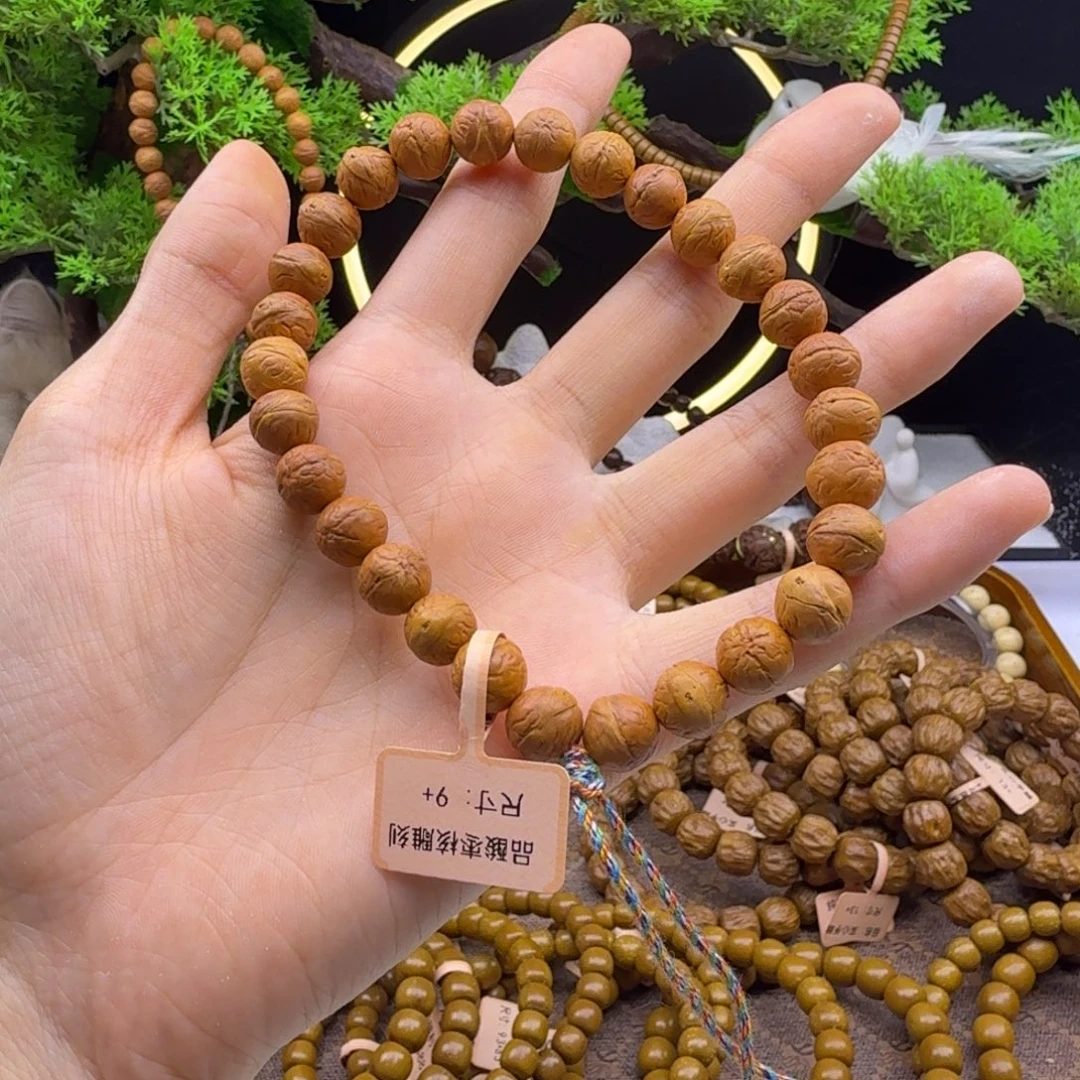 紫金鼠吊坠酸枣核雕刻的小凤眼