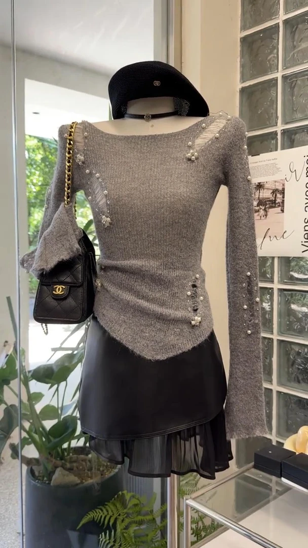 早秋一整套女装2025新款破洞镂空长袖针织衫包臀显瘦半身裙两件套