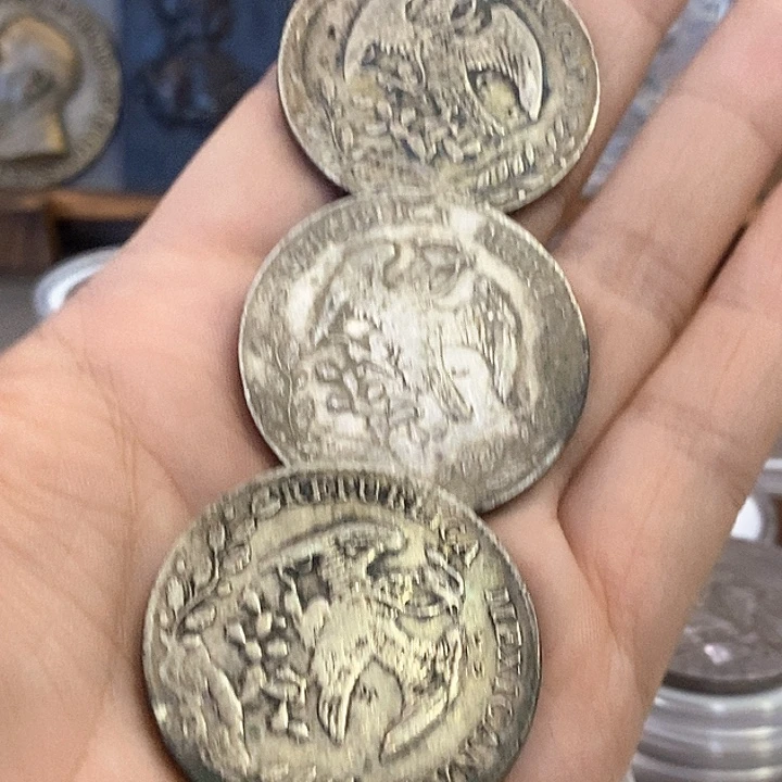 用***8银Ag900如图三个银币