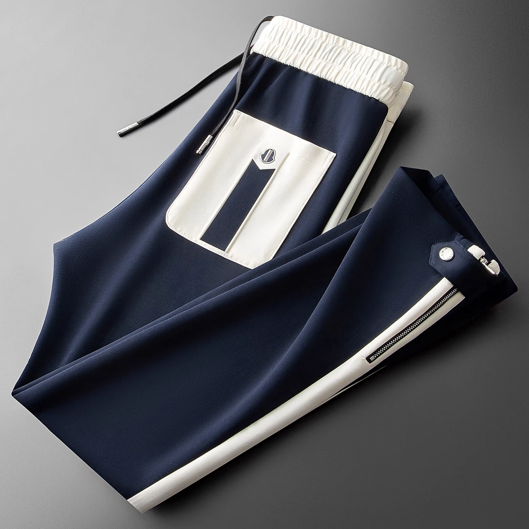 秋冬时尚潮流撞色拼接太空棉裤子面膜空气层直筒运动卫裤休闲裤男