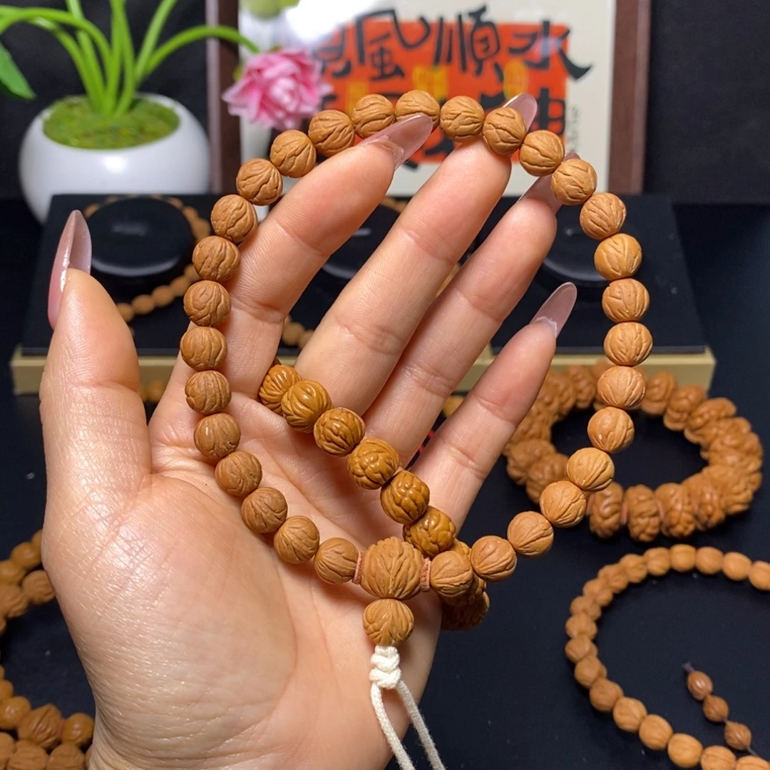 弥***怒桃核吊坠秦岭文玩