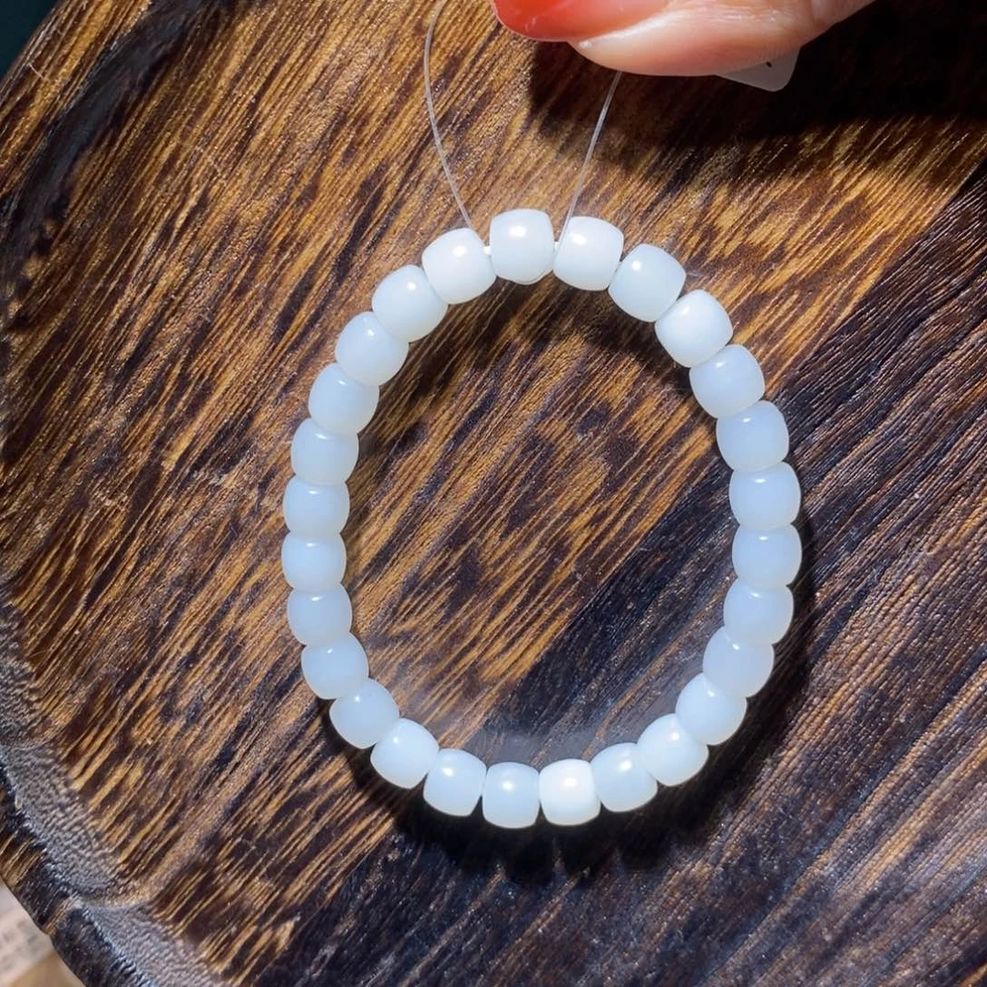 和田玉手串未镶嵌开****姜卡8直切