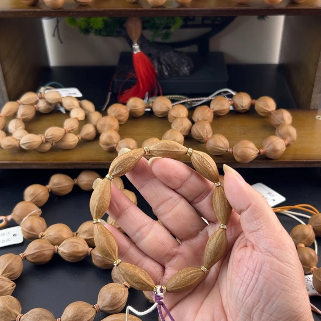 橄榄核吊坠梅林茶心核素串精品小世界稀有款