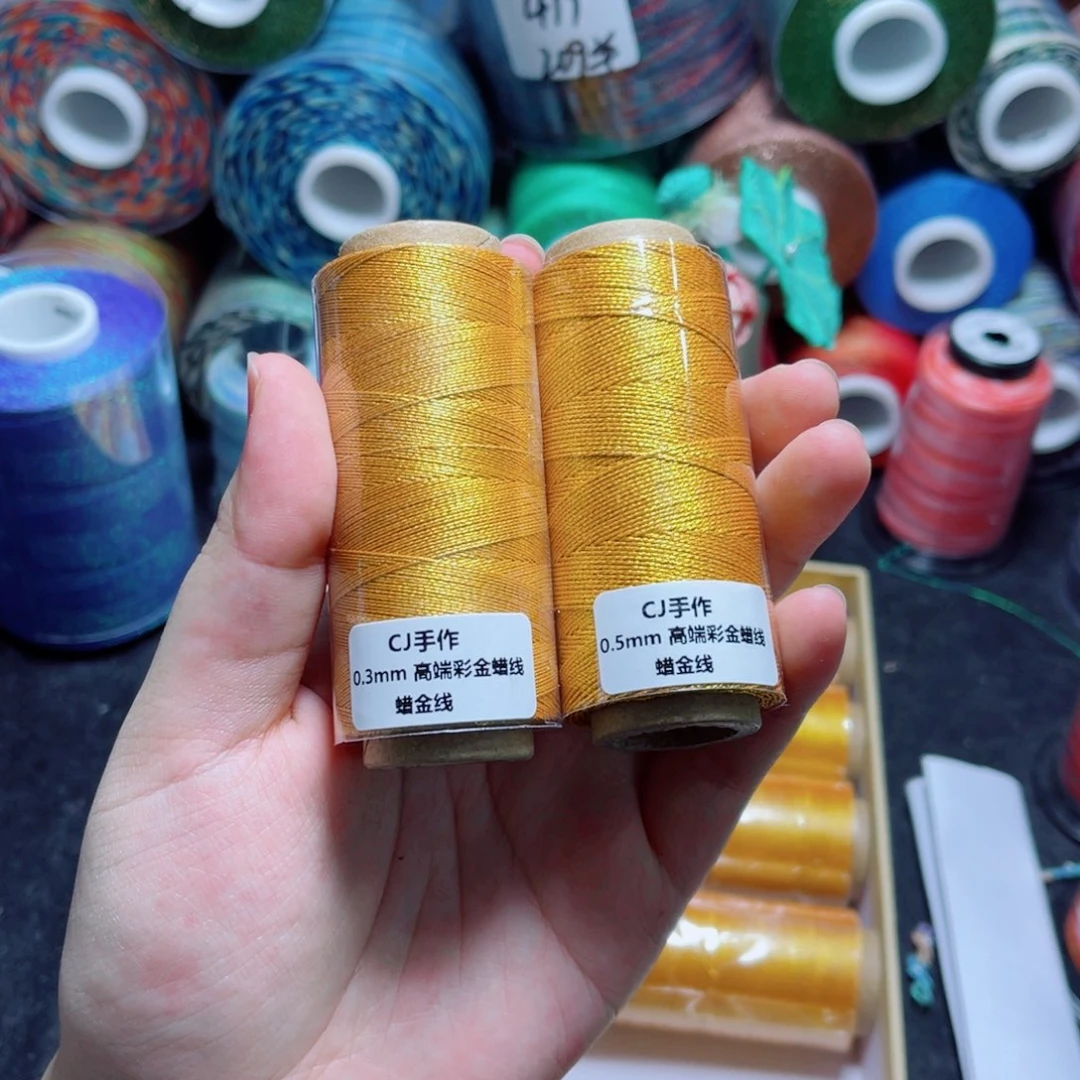 腈纶0.3+0.5高端彩金蜡线纸轴各一