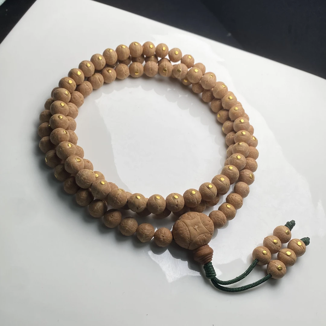 F0088尼泊尔实心小凤眼108颗念珠 10.0-10.4mm2.5金丁镶嵌备籽6颗