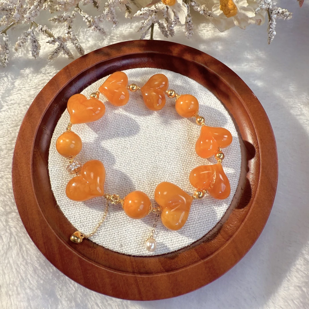 天然鸡油黄屁桃爱心大颗粒蜜蜡全金设计款手串