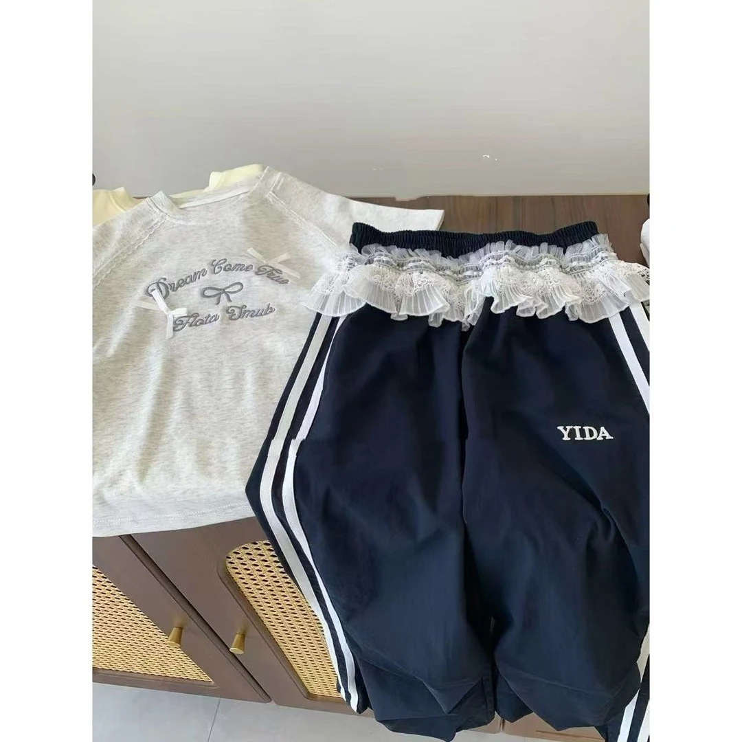 Q0552甜酷花边直筒字母长裤