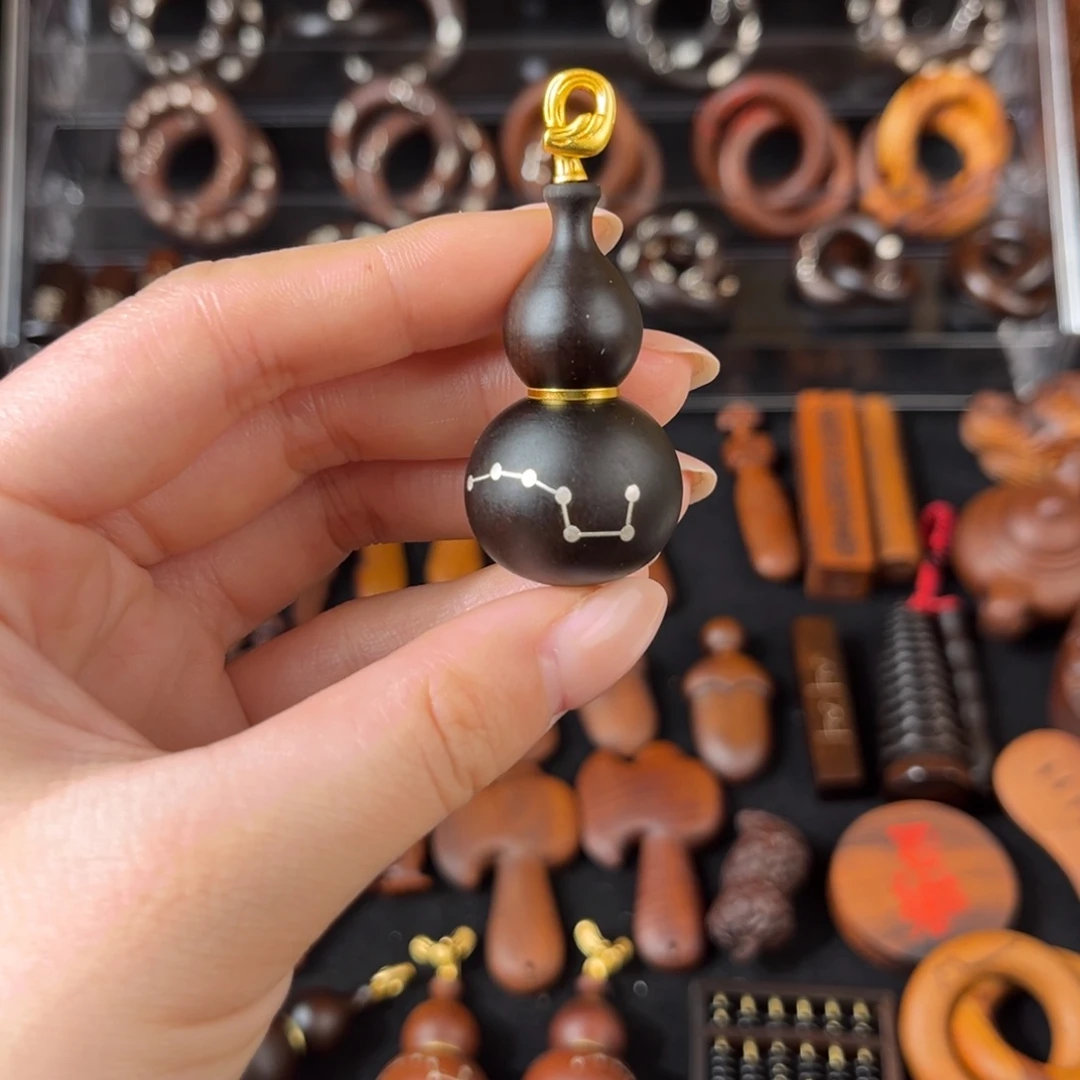 木雷枣玉化 镶银七星开口小葫芦