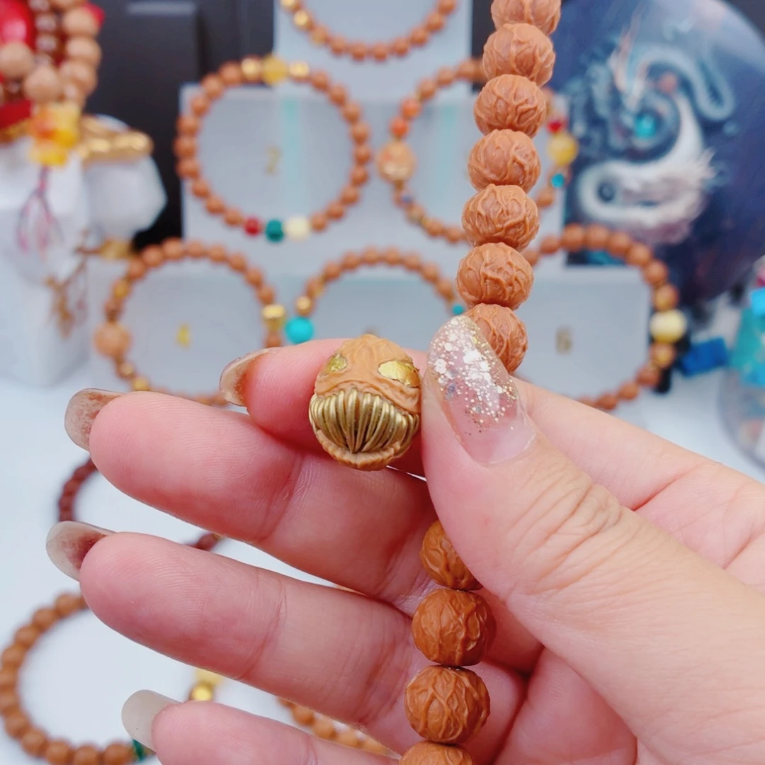 狂***。猴头核桃吊坠猴头手串