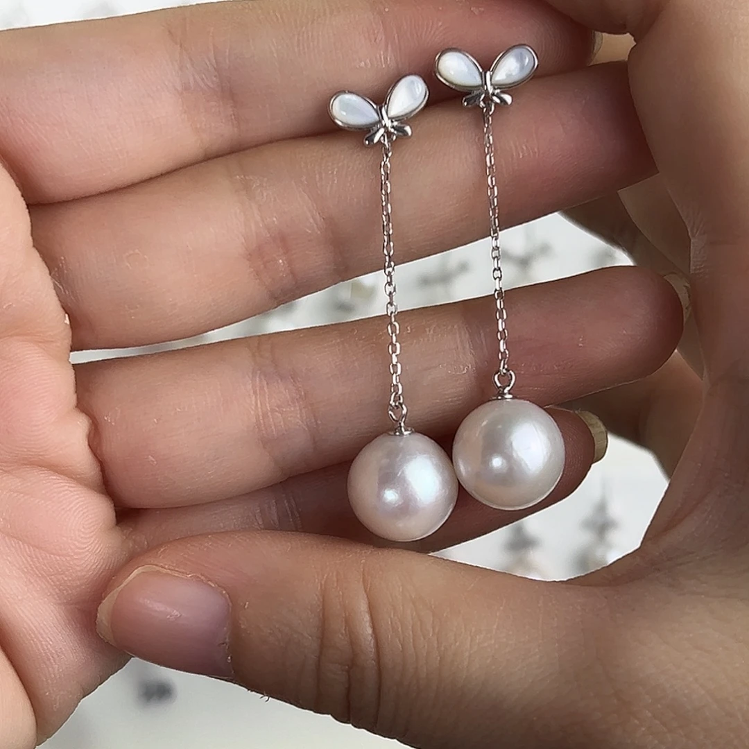 韦****银S925镶嵌淡水珍珠耳饰