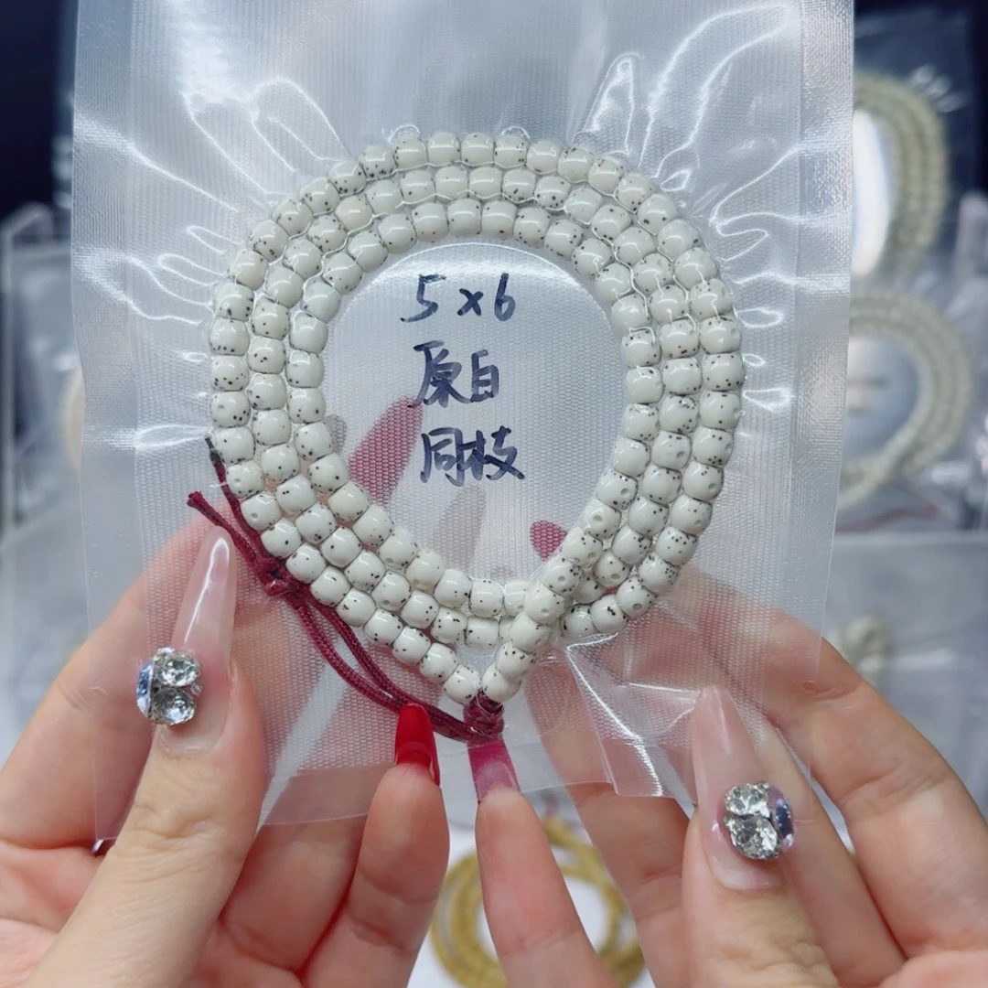 Y***吊坠星月菩提6*5原白直切鼓珠带月贯通