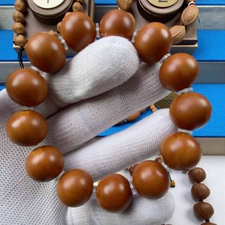 橄榄核手串虚***谷闪电购4