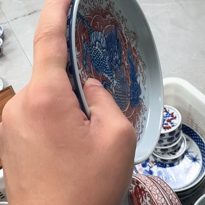 瓷片釉里红麒麟踏浪大壶乘