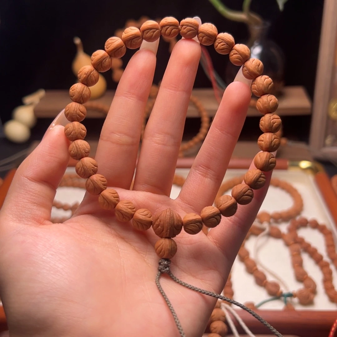 熏***"木质类陕西龙纹桃核9.0