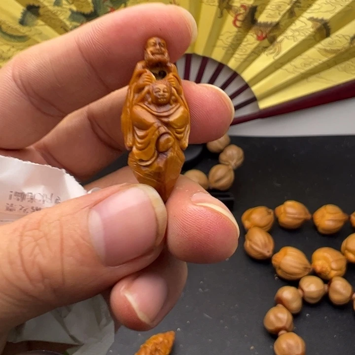 橄榄核手串/手链锜*咯哦收入下降了