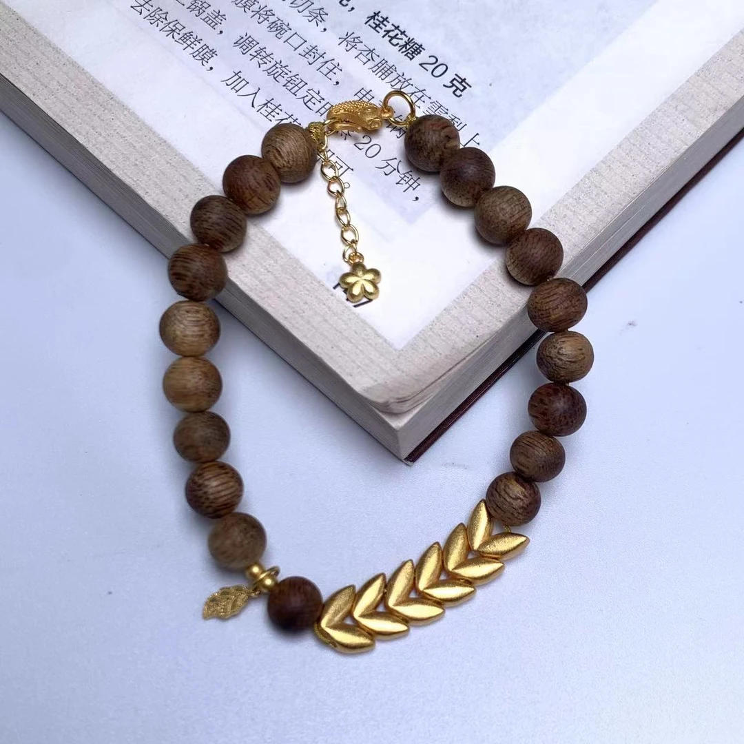 沉香【天禧】越南芽庄白奇楠蜜结醇化料0.7圆珠单圈设计限量款