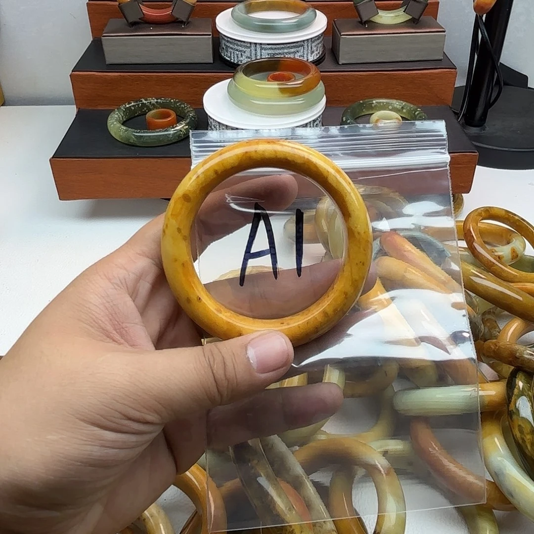 蛇纹石玉合金手镯笑**月