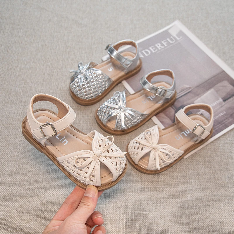 女童凉鞋2025夏季新款时尚编织蝴蝶结包头凉鞋宝宝洋气防滑沙滩鞋