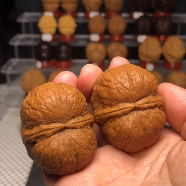 文玩核桃把件128峭壁元宝