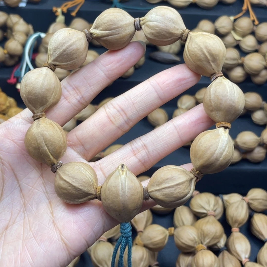 火***子001橄榄核三花20*25