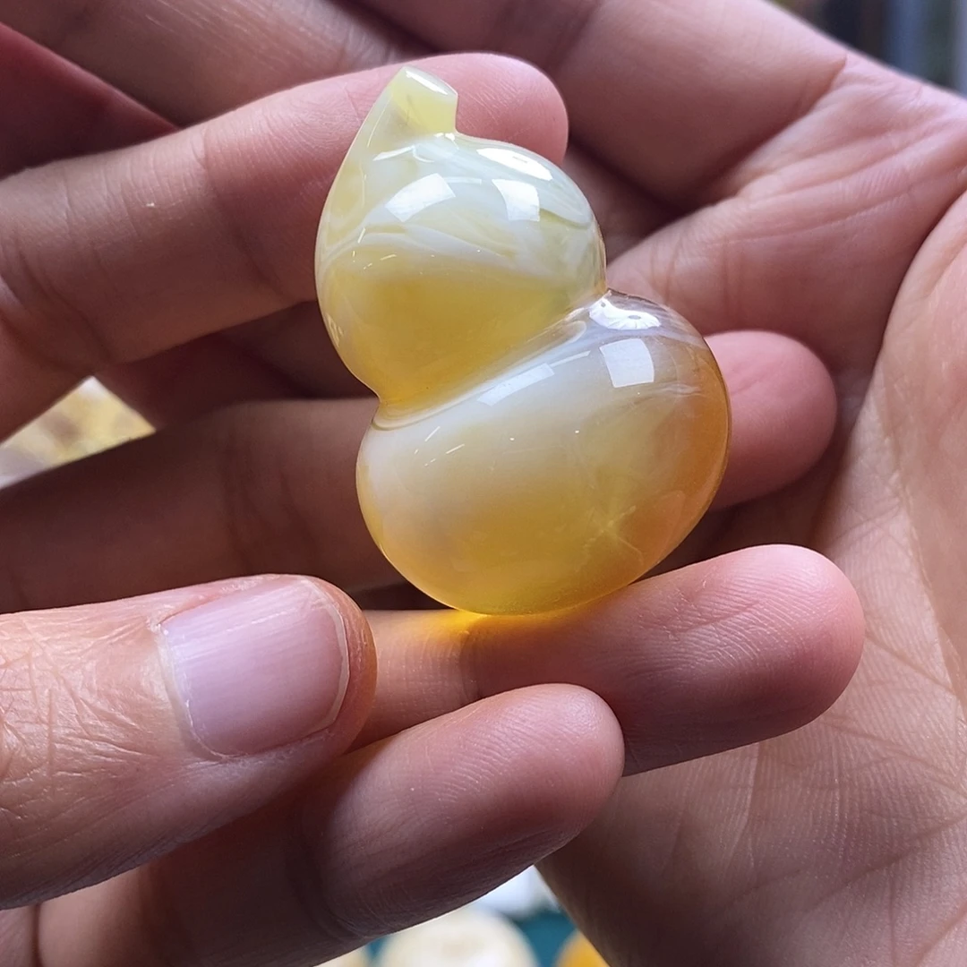 琥珀未镶嵌珠宝奇石13.73荧光拉丝妖花葫芦