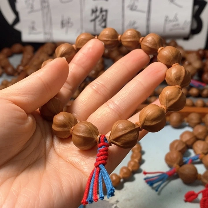 橄榄核手串5141精品蒜头铁核14+1颗