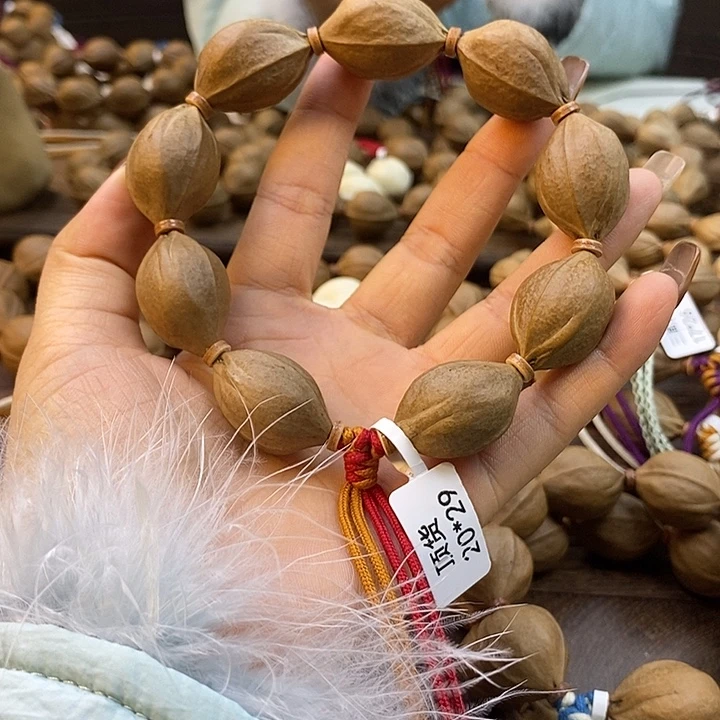 滕***！吊坠橄榄核梅林铁核