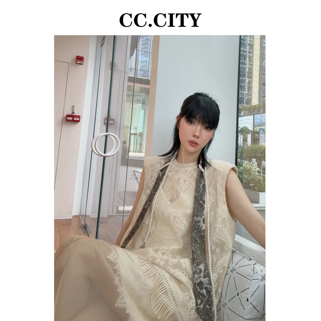 【蔡丽丽 & 添羽 】个性重工提花网银流苏领带珍珠宽松上衣wX50272
