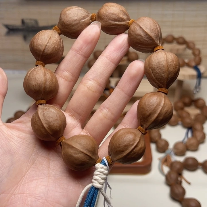 宠***馆橄榄核手串/手链22.26精品梅林铁核