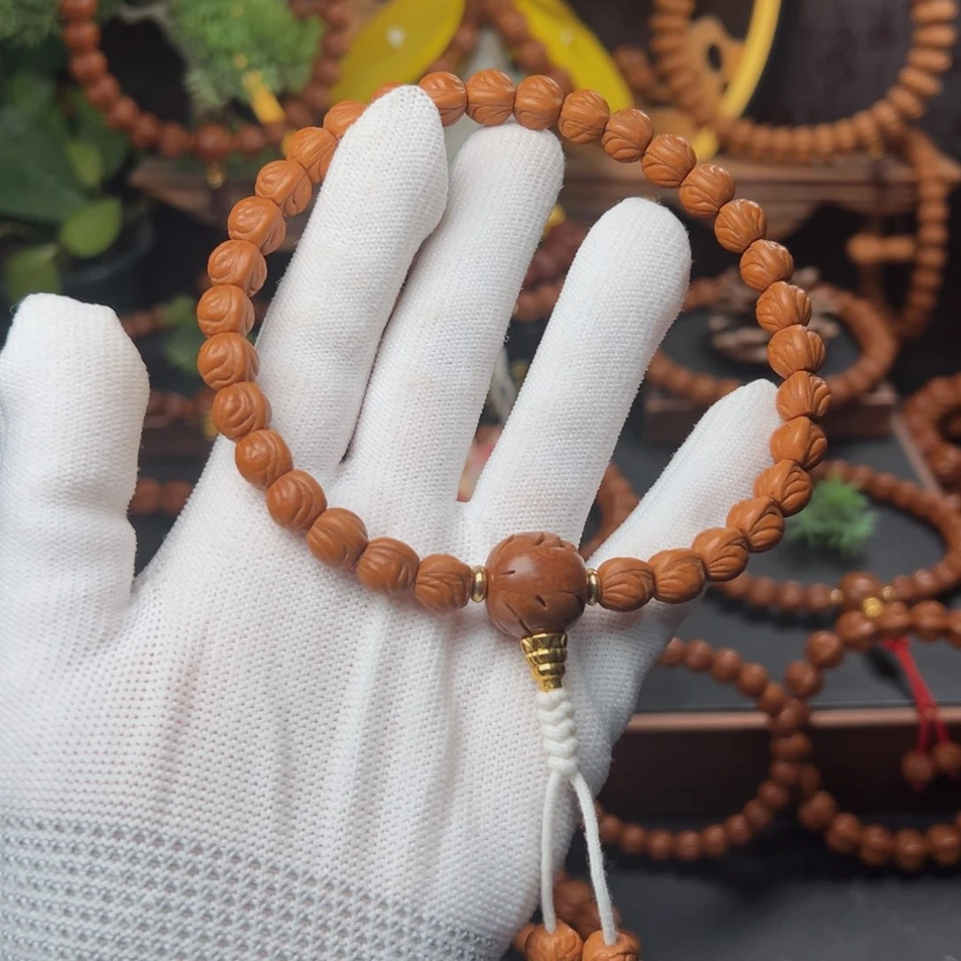 吊坠桃核左*0.9顶货金玉龙手持