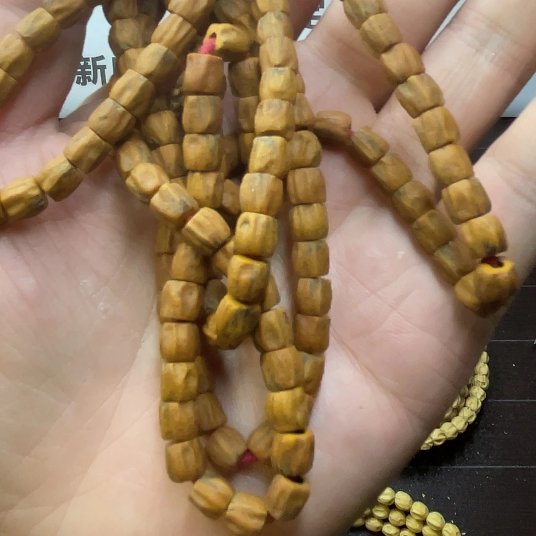 郁***熊柏香籽/百香籽吊坠