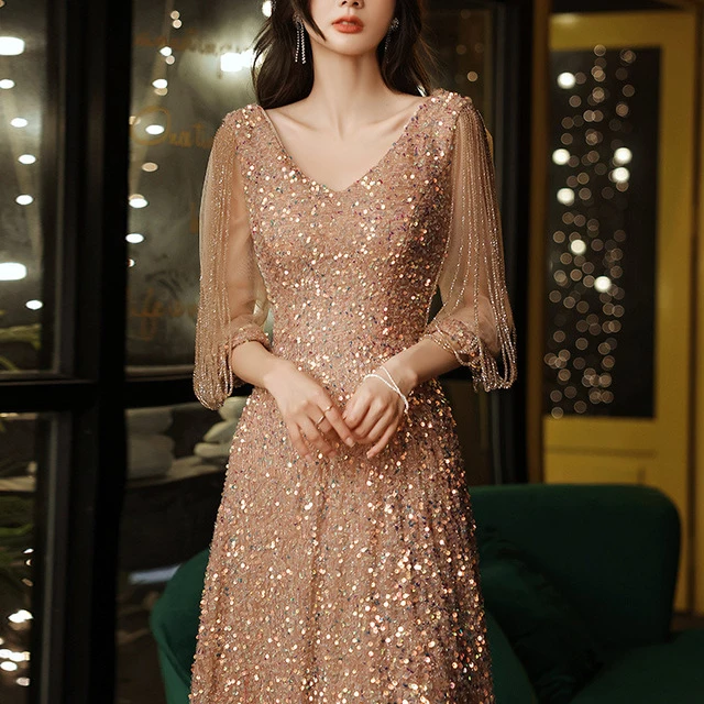 宴会晚礼服流苏V领亮片香槟色性感女王气质主持人礼服裙2025新款