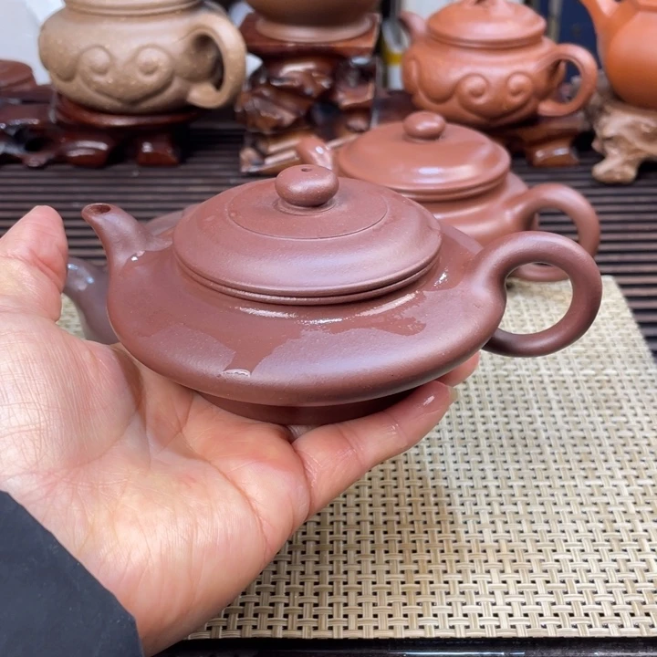 紫砂茶壶缘**此虚扁壶手工制作