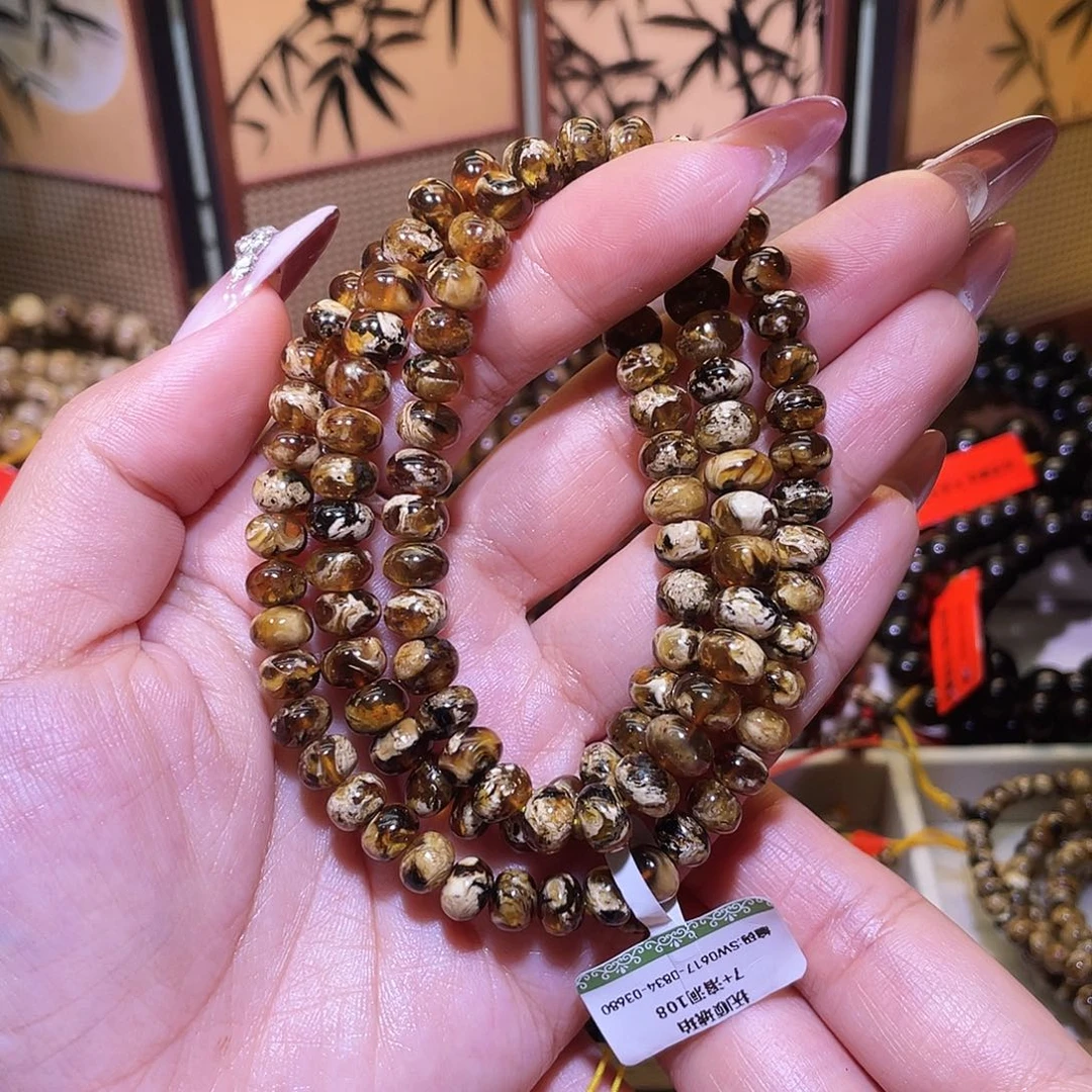 琥珀未镶嵌手链抚顺琥珀7+溶洞