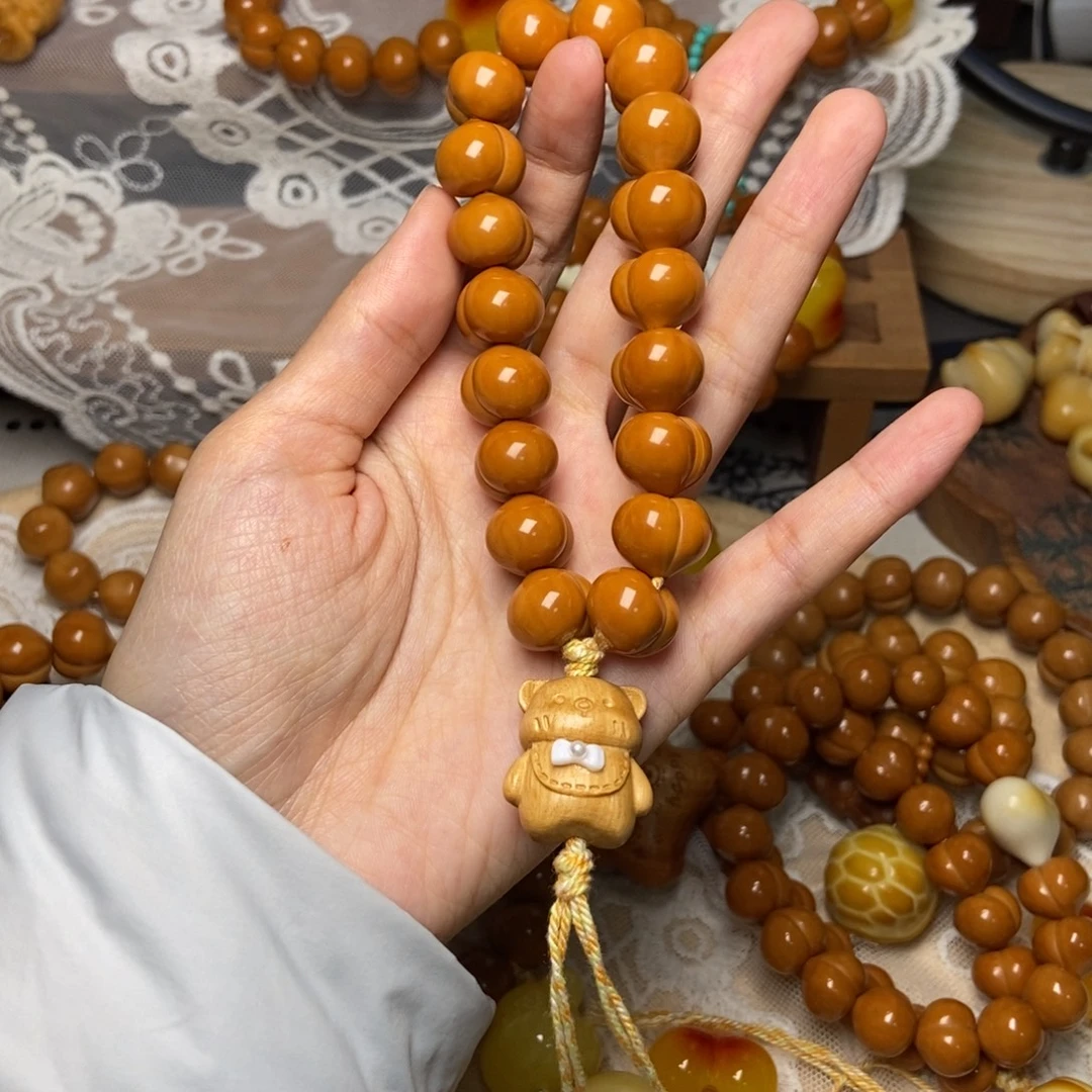 吊坠猴头核桃屁桃玻璃底卡14