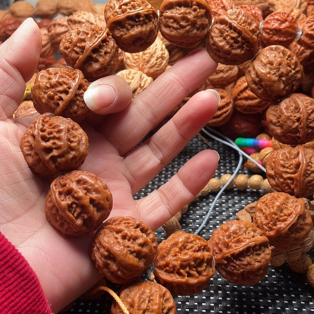 嗷***黑文玩核桃手串粗筋