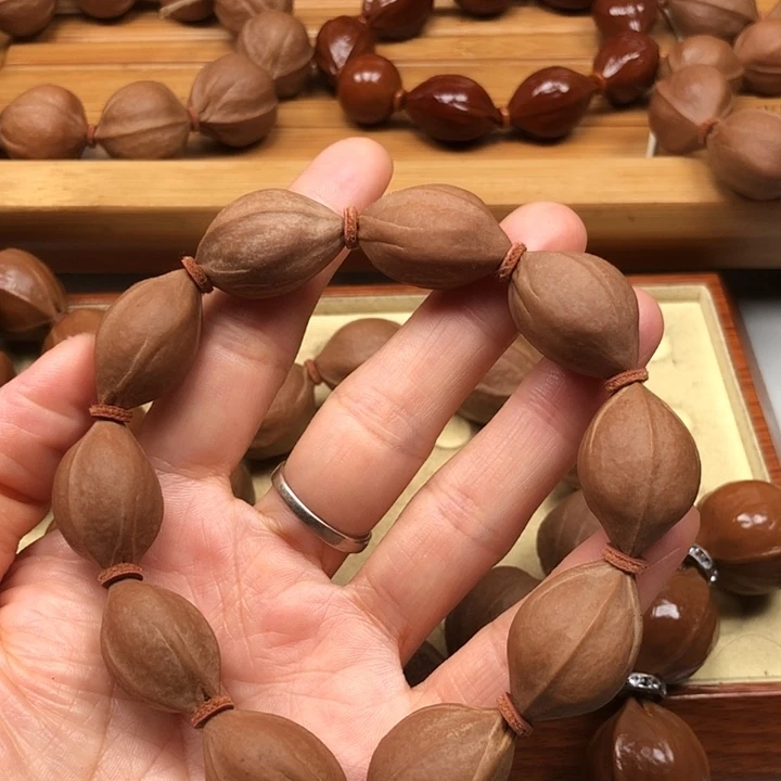 橄榄核手串梅林铁16 X25特价