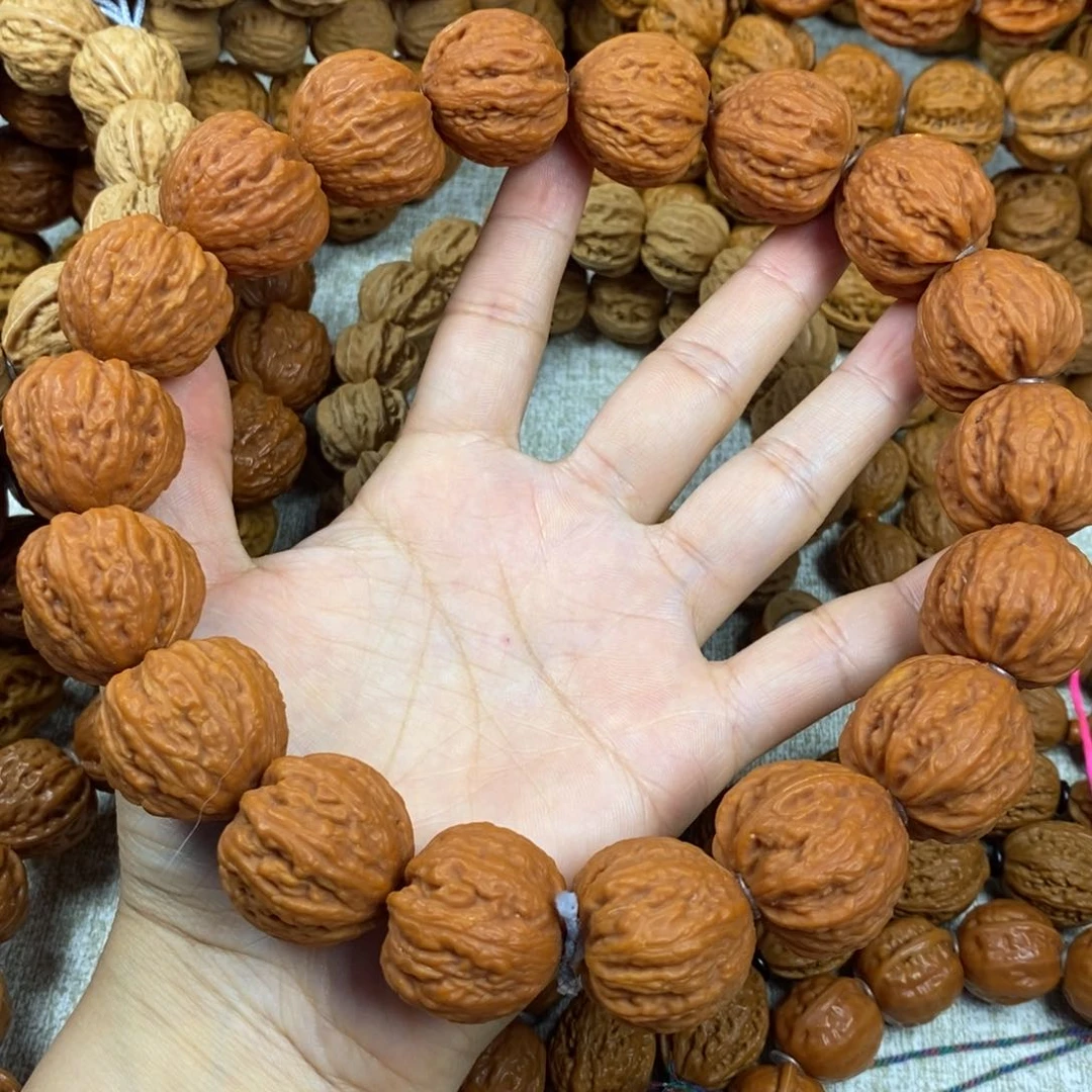 桃核吊坠红皮桃心