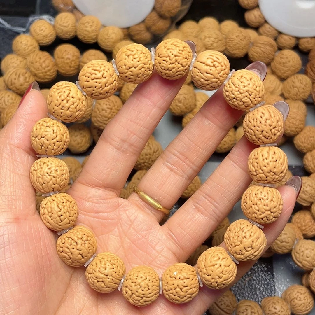 桃核手串贵**持15蚂蚁柳叶手串