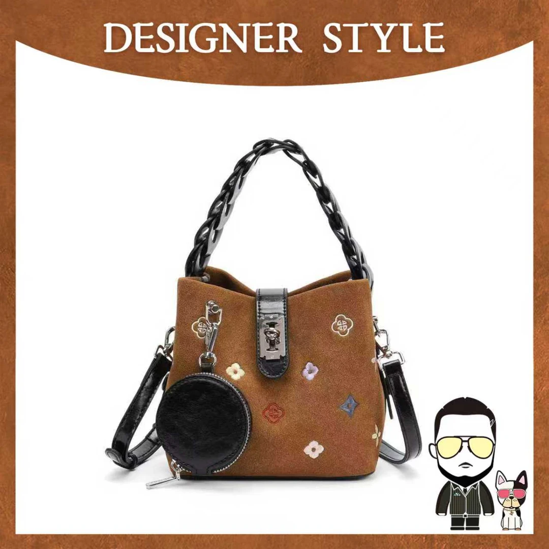 【左九设计师款】时尚设计师款刺绣抽绳水桶包8002309-1