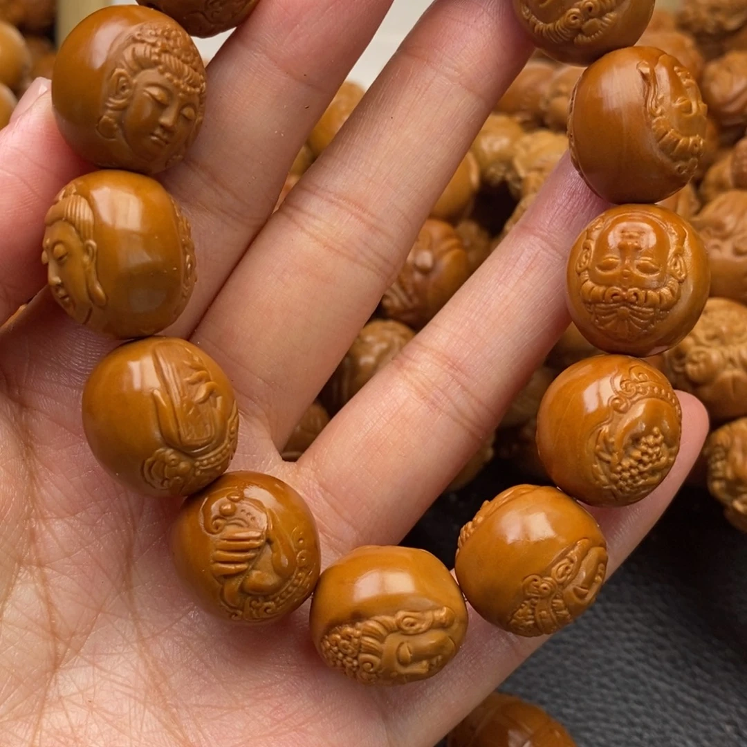 滑***)吊坠橄榄核浮雕观音特价