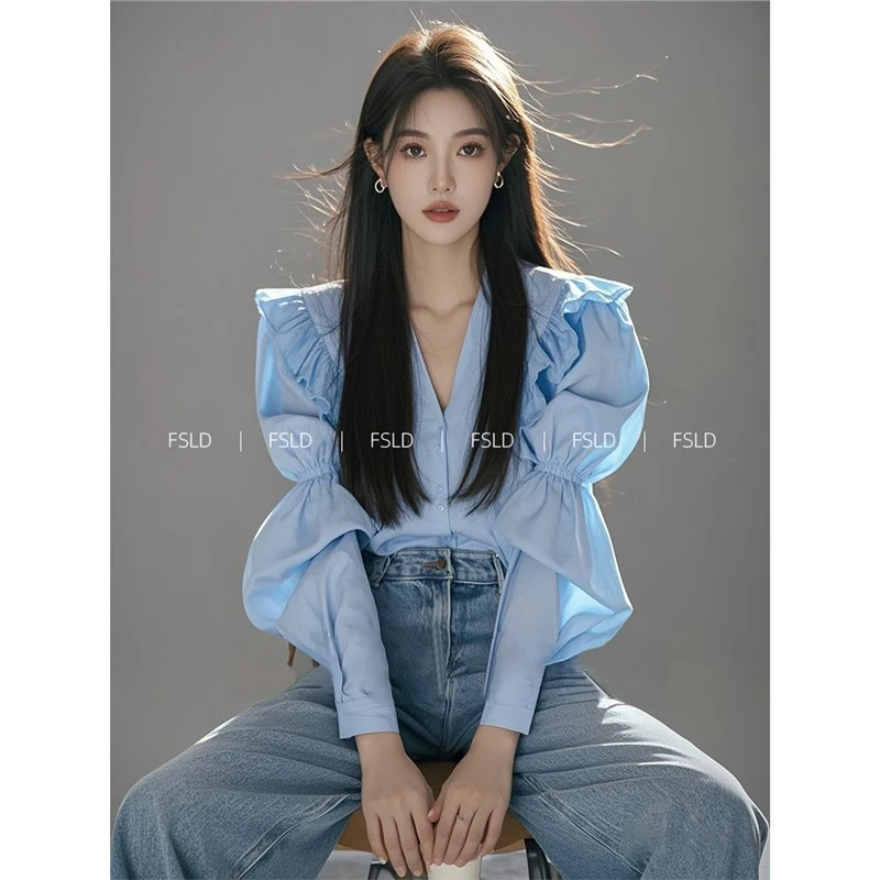 清冷感独特漂亮时尚小衫蓝色不规则袖衬衫2025新款超火女装上衣春