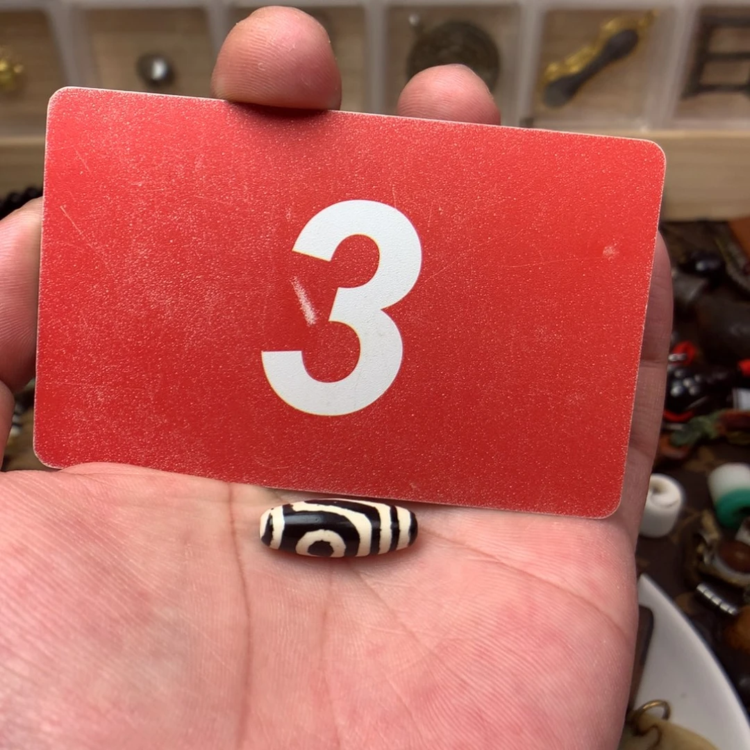 桃核吊坠鑫**n………………………………