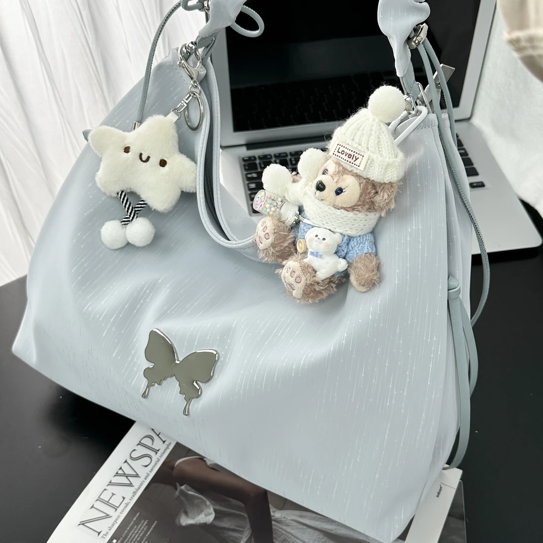 稻草人25新款大容量通勤高级感蝴蝶托特单斜挎包新