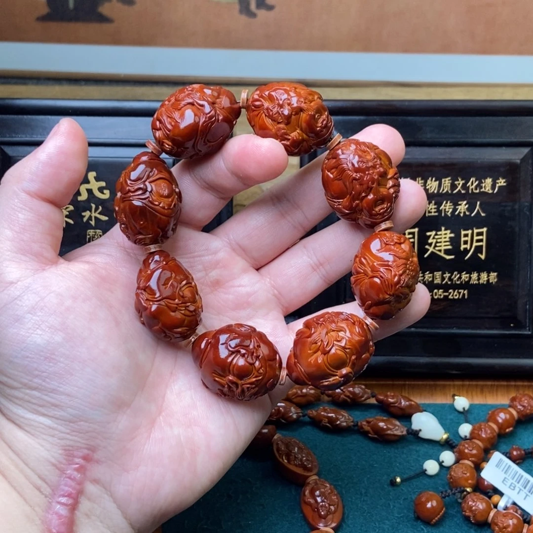 手串橄榄核龙财神