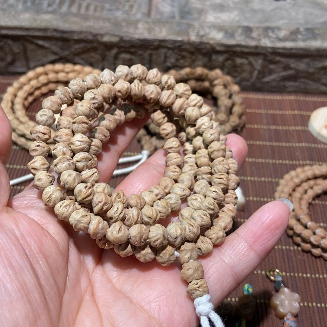 贝***壳柏香籽/百香籽吊坠