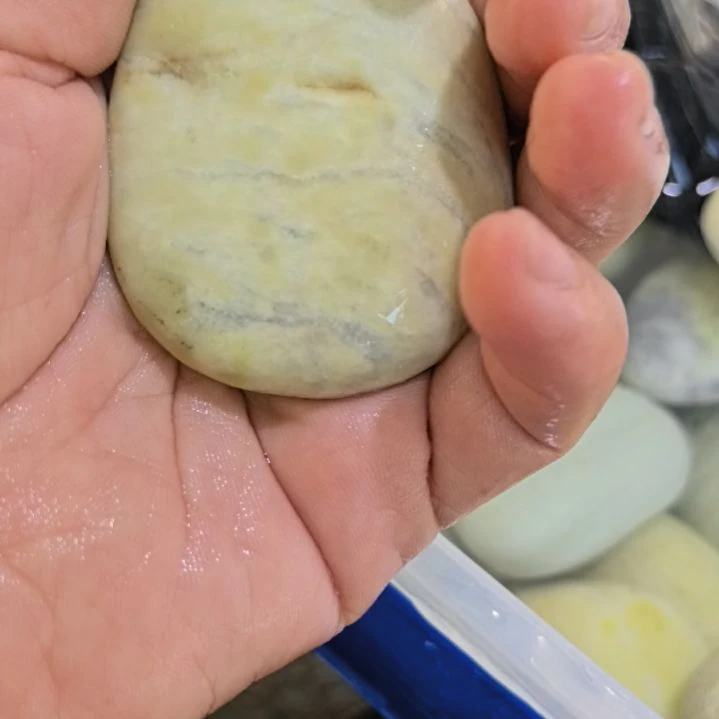 硫***幺有机玻璃藏玉药王石原石手把件一个