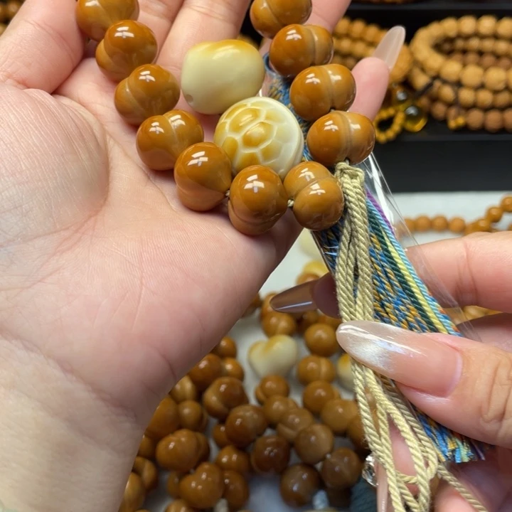 玉***吖猴头核桃吊坠全品柯基屁桃加爱心富甲