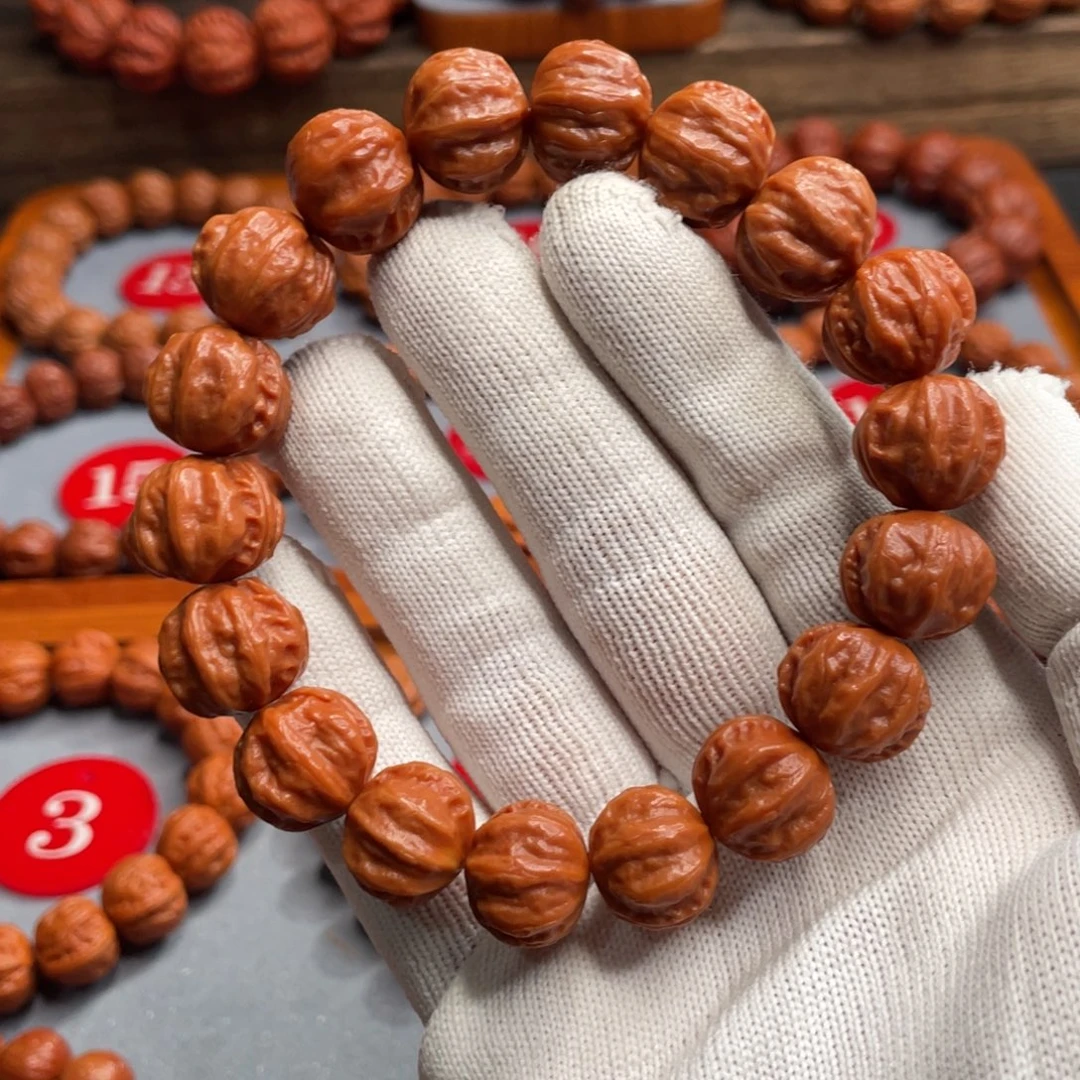 东***人手串文玩核桃磨盘